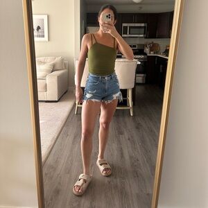 Superdown bodysuit with asymmetrical top and spaghetti straps